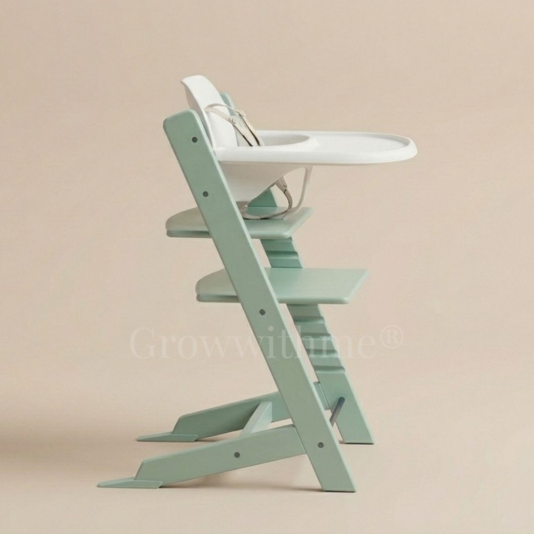 Growwithme embo+ mint green high chair with white seat on a beige background